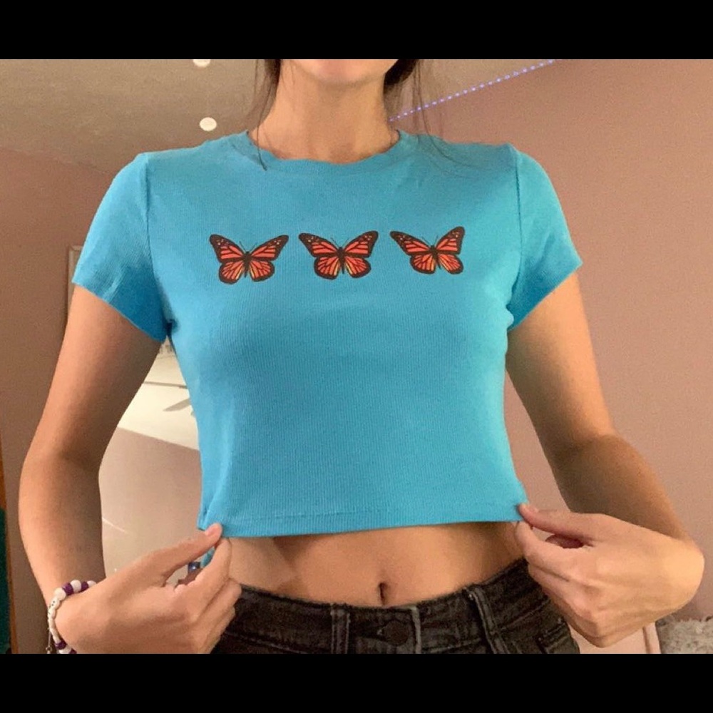 blue crop top with 3 butterflies